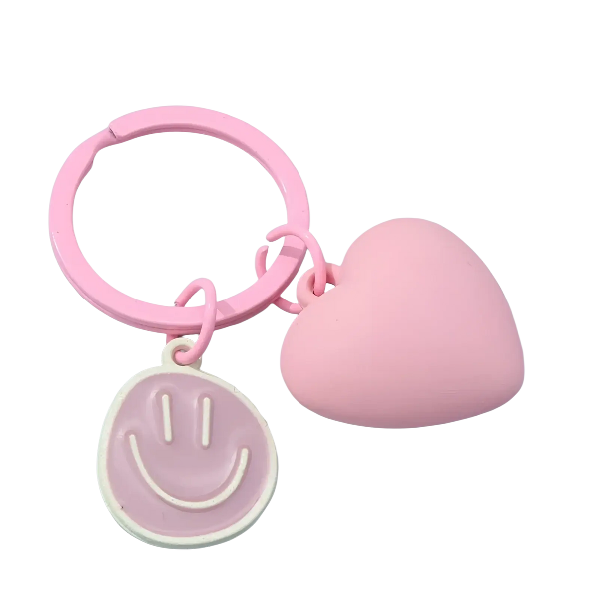Pink plastic keychain with a heart-shaped charm and smiley face pendant for decorative use
