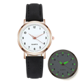 Pink leather quartz watch for women with rose gold case and white dial featuring inset with green glowing numerals