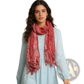Pink leopard viscose scarf with metallic threads in soft dusty rose featuring a subtle textured pattern and frayed edges