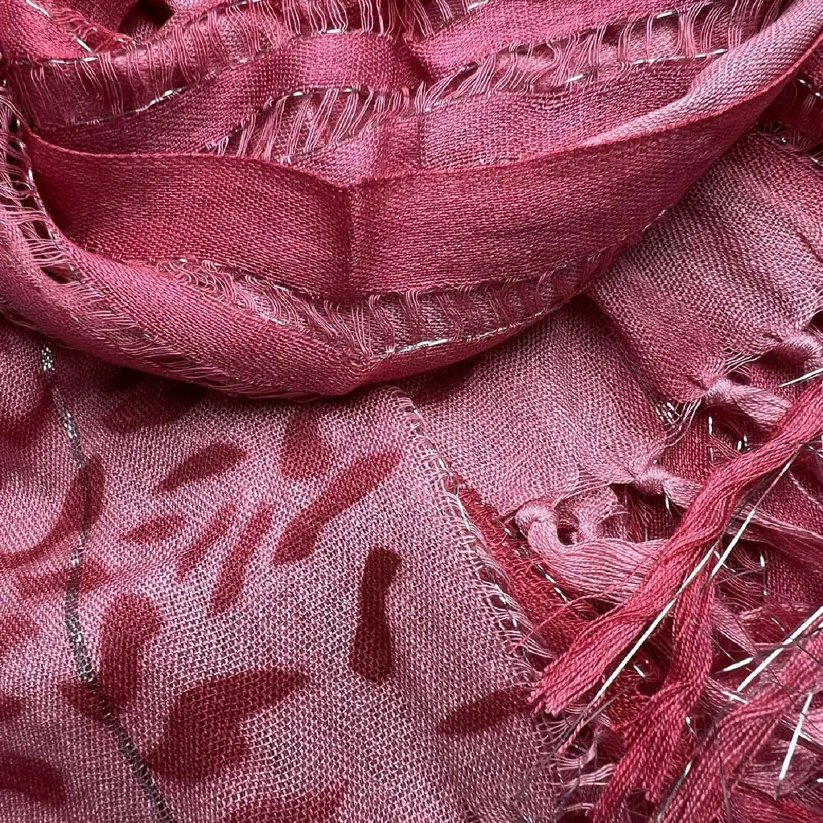Pink leopard viscose scarf in dusty rose with metallic threads textured abstract pattern and frayed edges