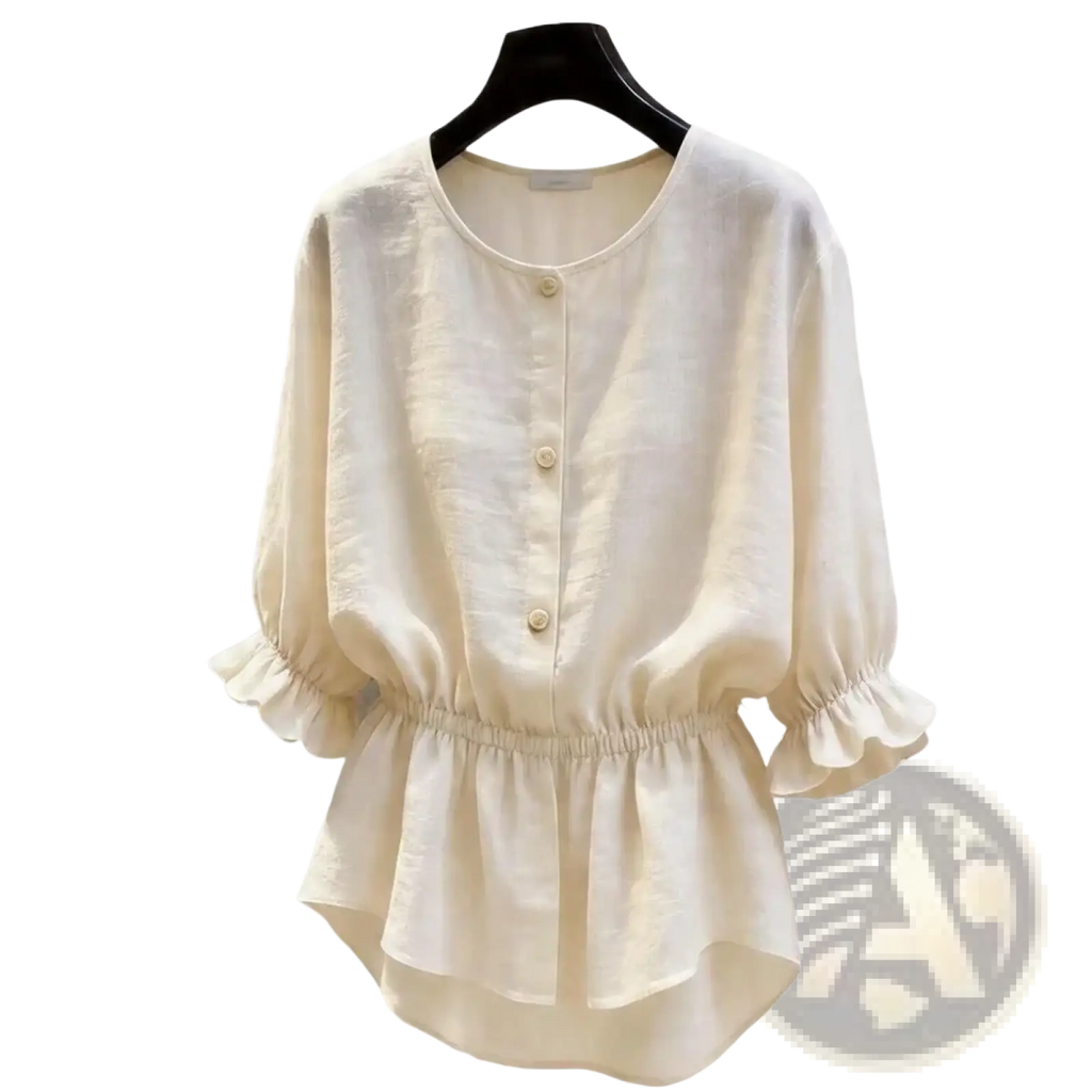 Cream-colored linen blouse with three-quarter length sleeves and ruffled cuffs in a pink linen peplum blouse style