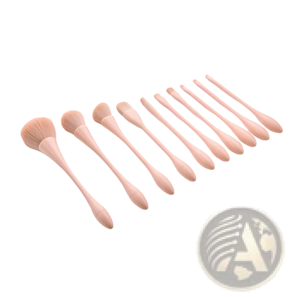 Set of ten blush-toned wooden makeup brushes with soft nylon bristles and tapered handles for professional use