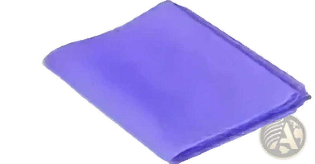A soft folded purple microfiber towel alongside pink pilates resistance bands for fitness and exercise use