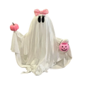 A white fabric pink pumpkin ghost halloween tabletop decoration with black eyes, a pink bow, and pink pumpkin accessories