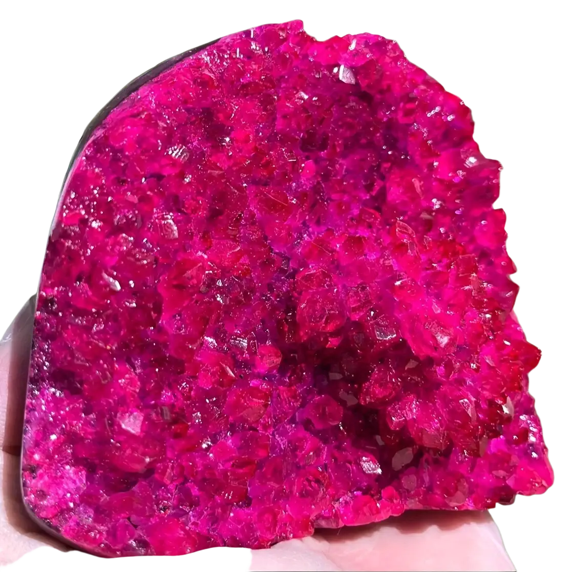 Pink quartz geode crystal cluster with vibrant fuchsia-red sparkling facets and rough textured surface for home decor