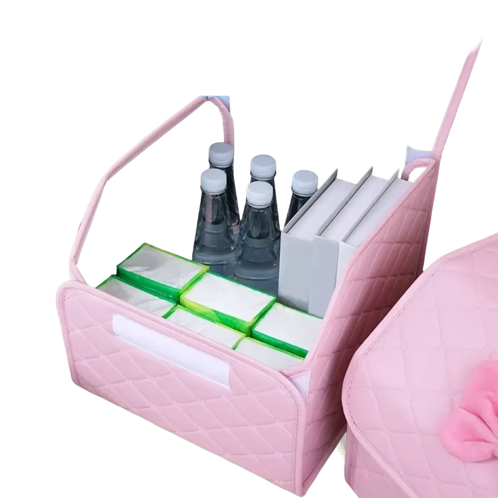 Pink quilted car trunk organizer with bow and black interior holding water bottles and tissue packs