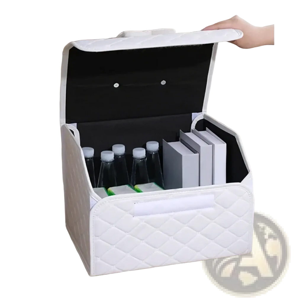 White quilted car trunk organizer with black interior and silver rivets shown in contrast to pink quilted model with bow