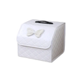 White quilted fabric car seat cover with black handle and off-white bow for pink quilted car trunk organizer