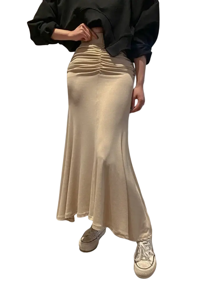 Cream-colored satin midi skirt with a ruched waistband and flared hem in a pink ruched high waisted mermaid style