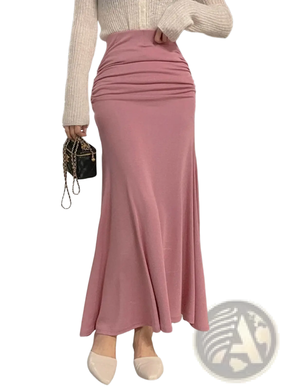 A soft pink mermaid midi skirt with high waist and flowing ruched design perfect for elegant occasions