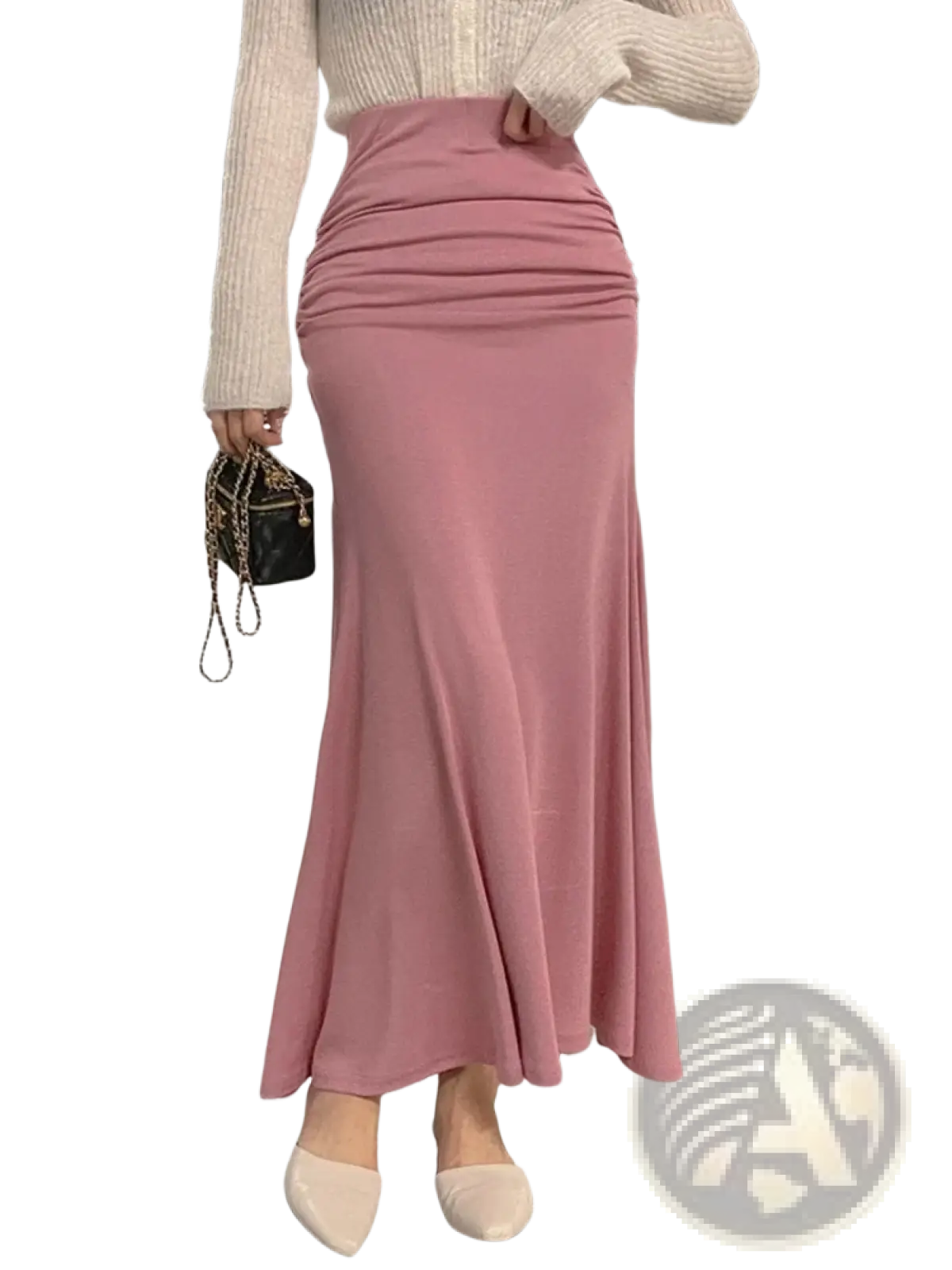 A soft pink mermaid midi skirt with high waist and flowing ruched design perfect for elegant occasions