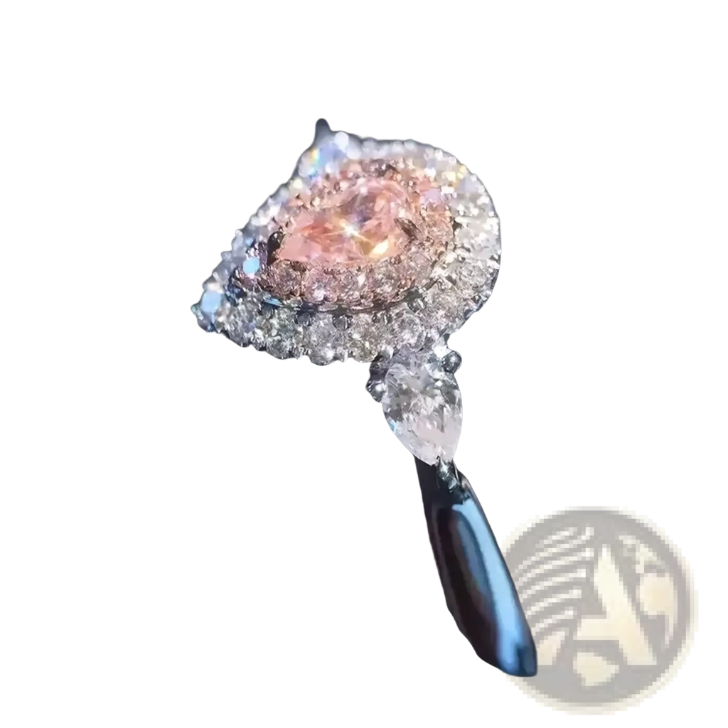 A pink teardrop zircon engagement ring with a central pear-shaped pink diamond and a dangling teardrop-cut diamond
