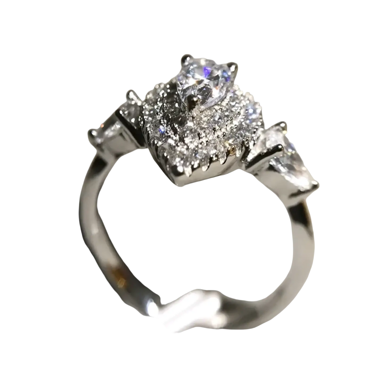 A pink teardrop zircon engagement ring with a sparkling silver band and pear-shaped diamond surrounded by round and baguette diamonds
