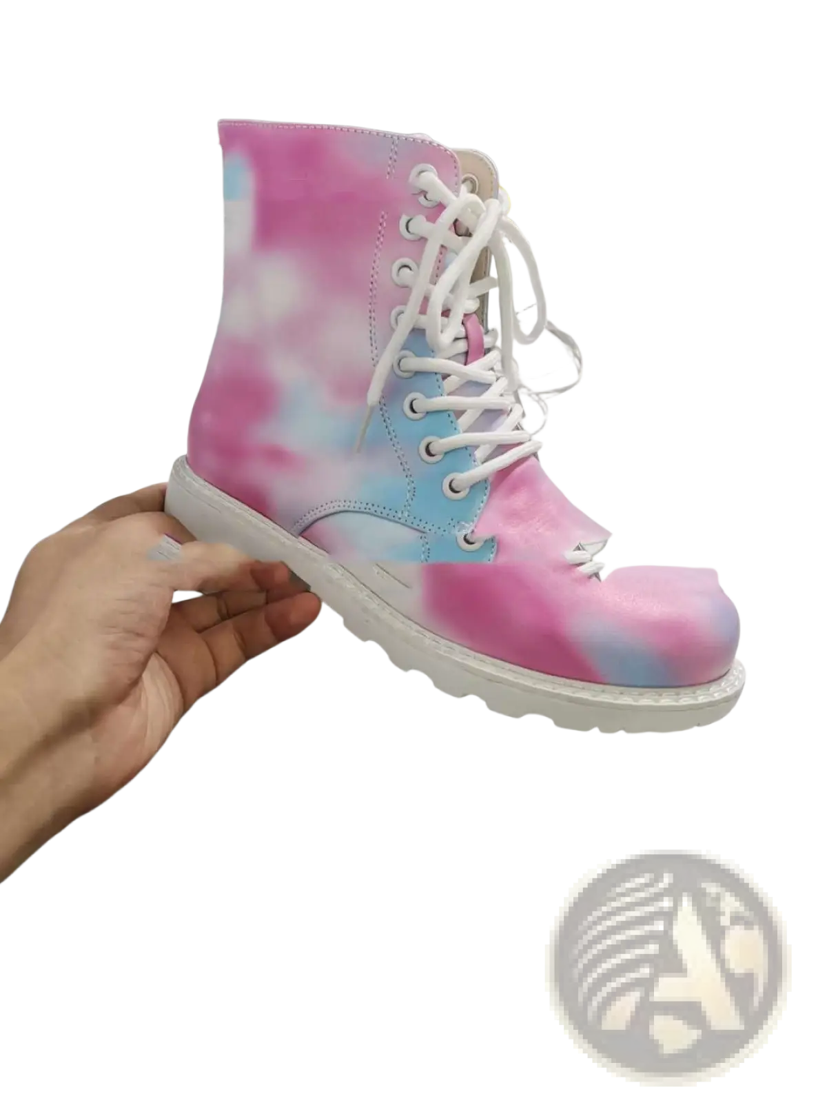 A vibrant pink and blue tie dye combat boot with white laces and a chunky white sole for stylish wear