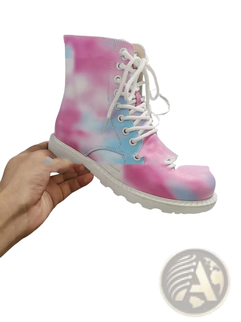 A vibrant pink and blue tie dye combat boot with white laces and a chunky white sole for bold style