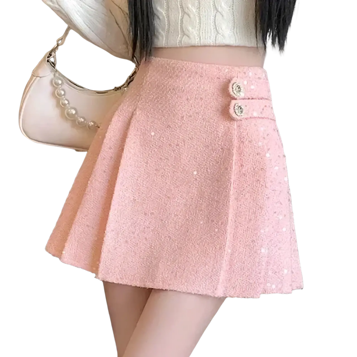 Pink tweed pleated mini skirt featuring decorative button accents in a stylish feminine design