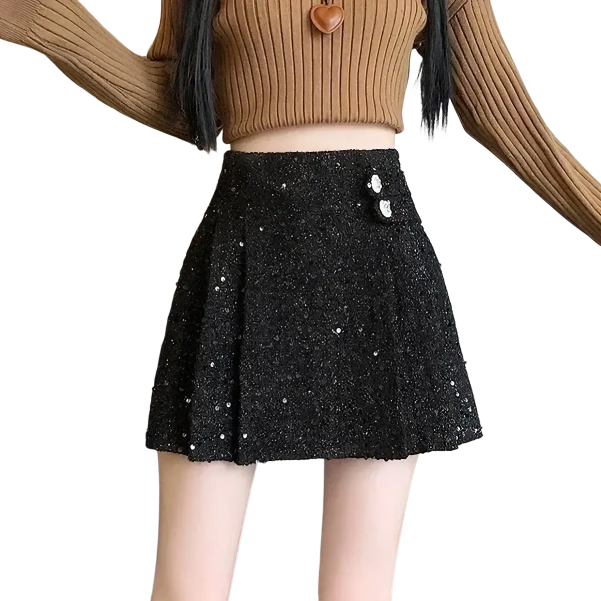 Black sequined pleated mini skirt with silver button accents shown from the front for a stylish evening look