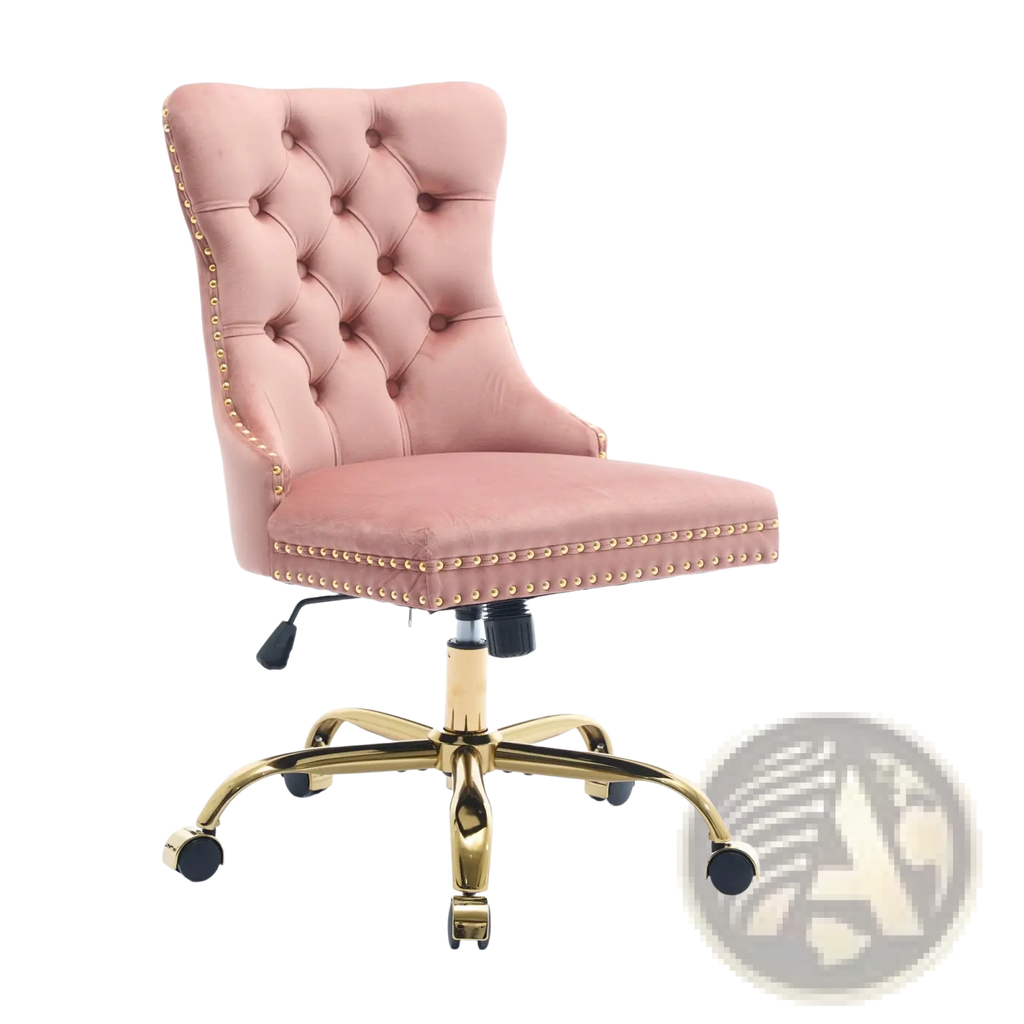 A blush pink velvet tufted office chair with gold nailhead trim and polished brass base for stylish workspace