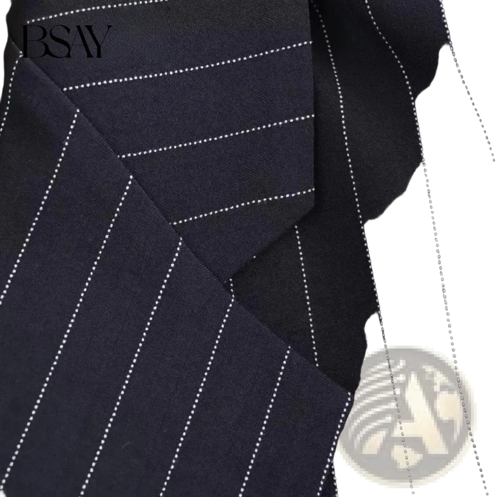 Dark navy pinstripe double-breasted blazer fabric for women with fine white dotted lines and elegant tailored design