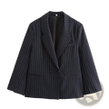Black pinstripe double-breasted blazer for women with white vertical stripes in a formal tailored design