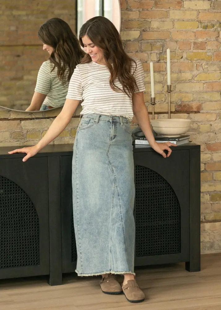 Light-wash denim midi skirt with straight cut and frayed hem from Piper collection designed for casual wear