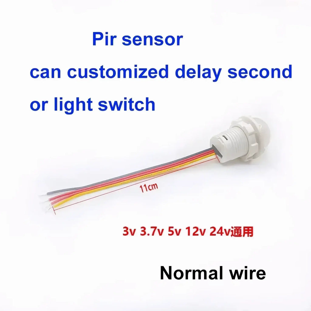 White plastic pir motion sensor switch for led strip lights with multi-colored wires extending from its base