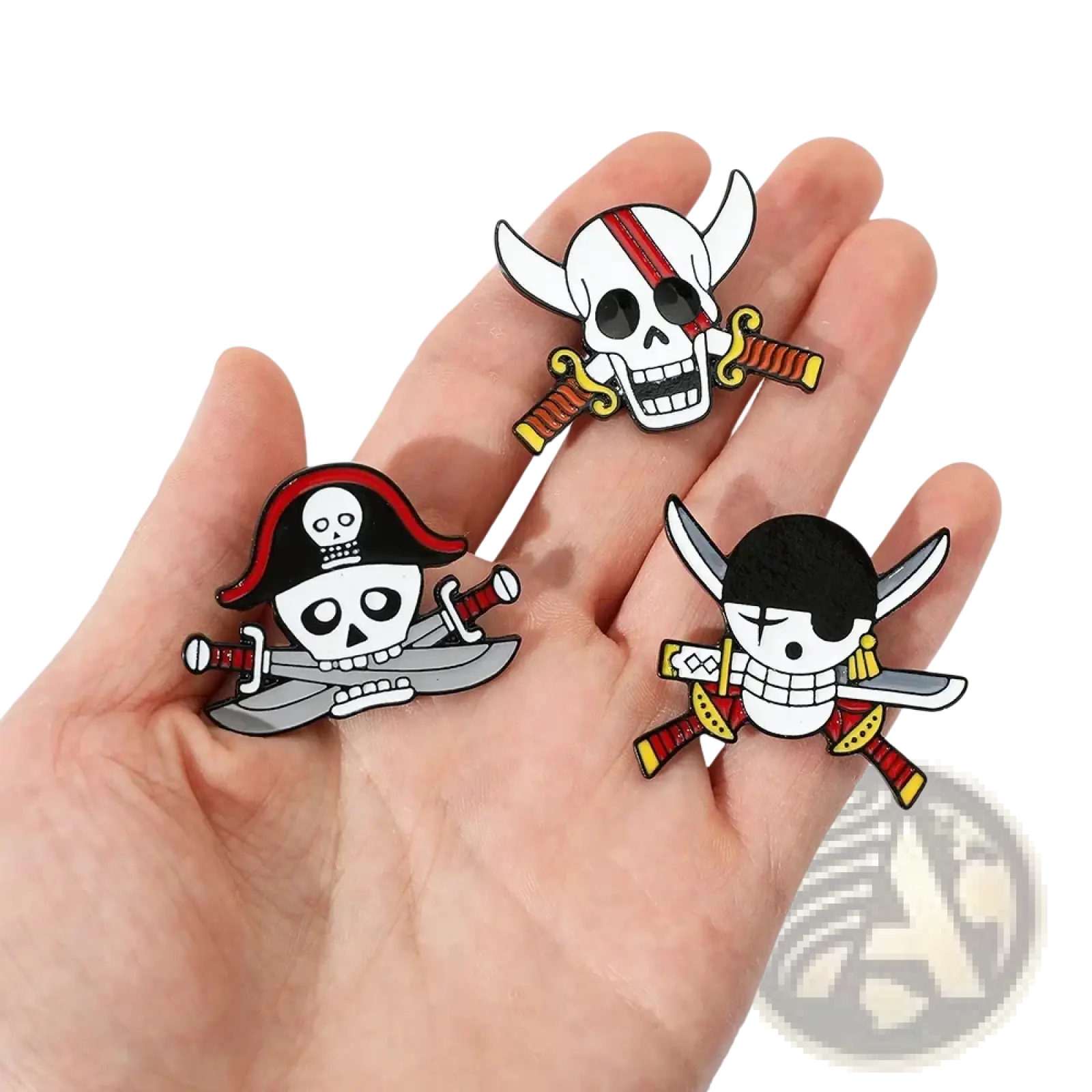 Three enamel pirate-themed pin badges featuring skull and crossbones designs with red white black silver gold and yellow accents