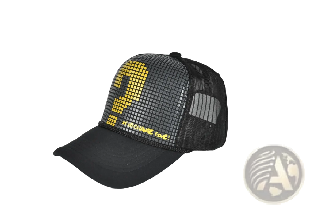 Black trucker hat featuring a pixelated yellow question mark and by change come text on the front panel