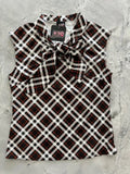 Black white and red plaid sleeveless blouse with oversized bow at neckline perfect for halloween attire