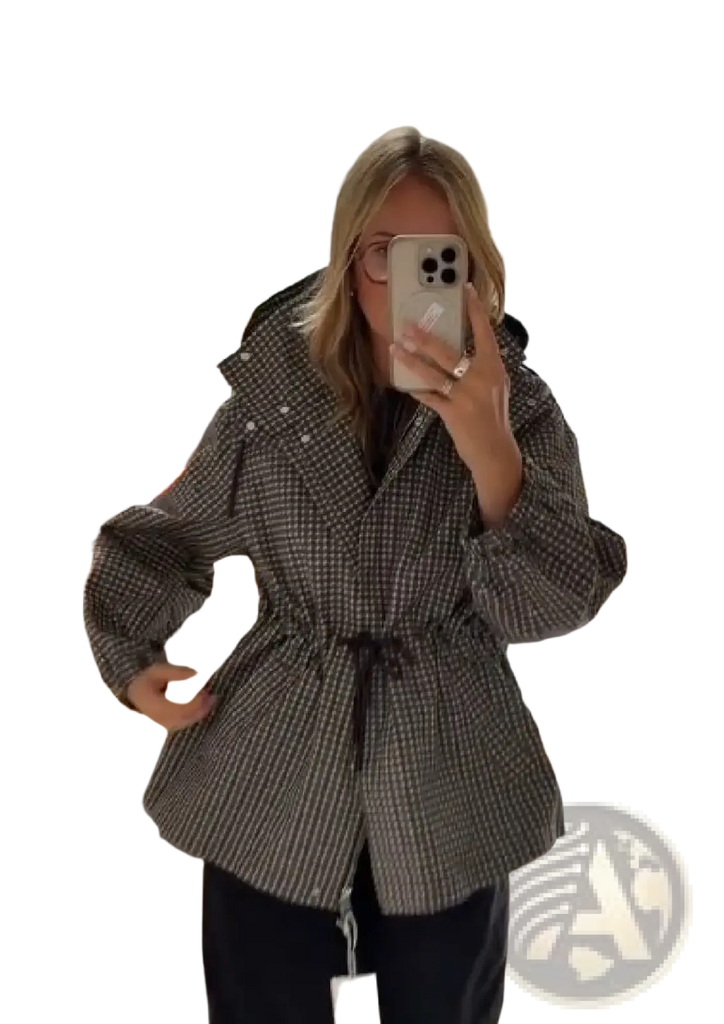 A stylish plaid hooded trench jacket for women in muted grey and black herringbone with a cinched waist belt