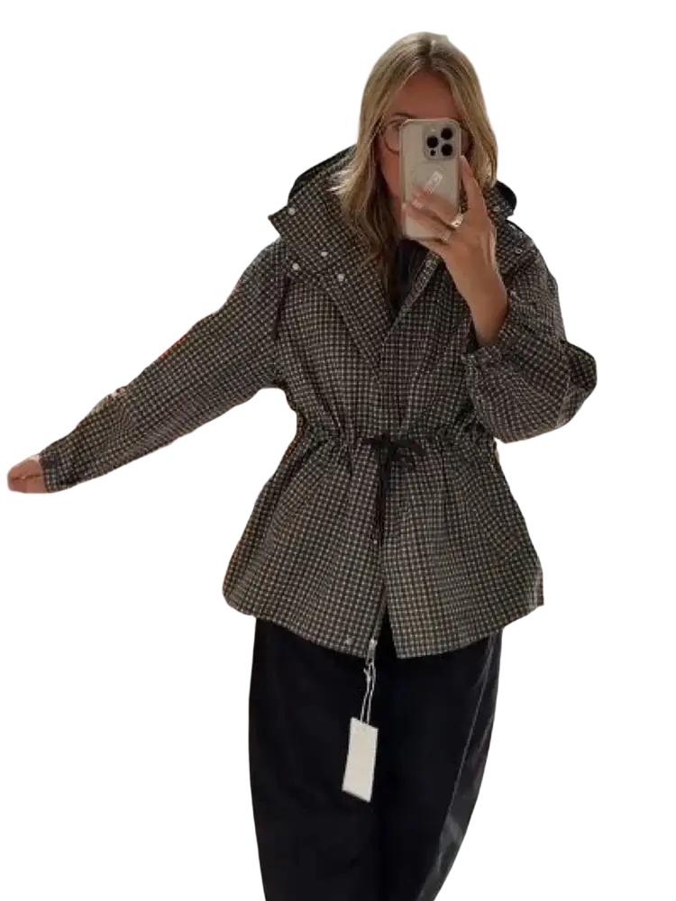 A stylish black and beige houndstooth belted trench coat with structured collar for women fall outerwear