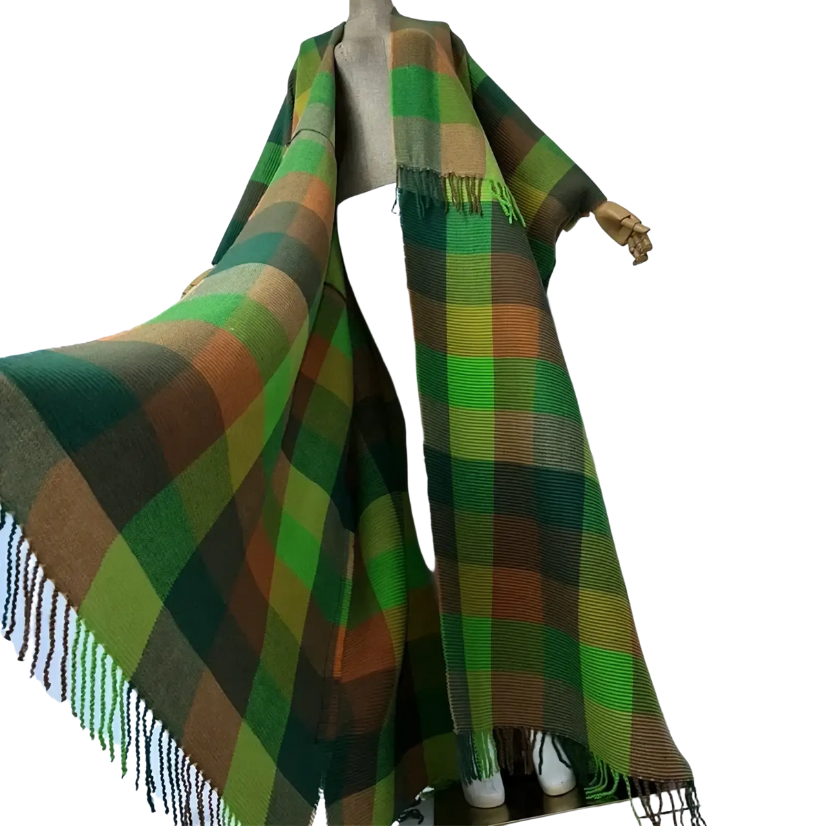 A vibrant green orange and brown plaid woolen shawl with fringed edges displayed on a mannequin