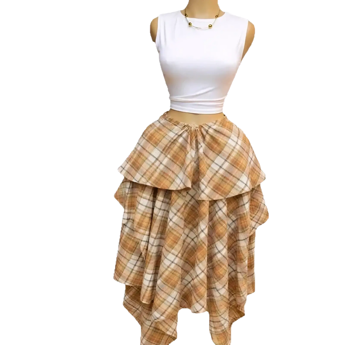 A tiered asymmetrical plaid a-line midi skirt in warm beige and cream tones with a gathered waistband