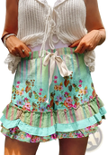 A vibrant mint green plaid patchwork a-line skirt featuring floral ruffles, striped accents, and a drawstring waistband