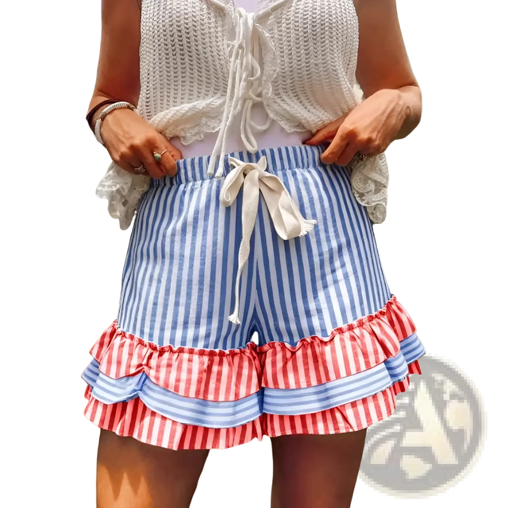Plaid patchwork a-line skirt featuring blue and white striped shorts with a red and blue ruffled hem