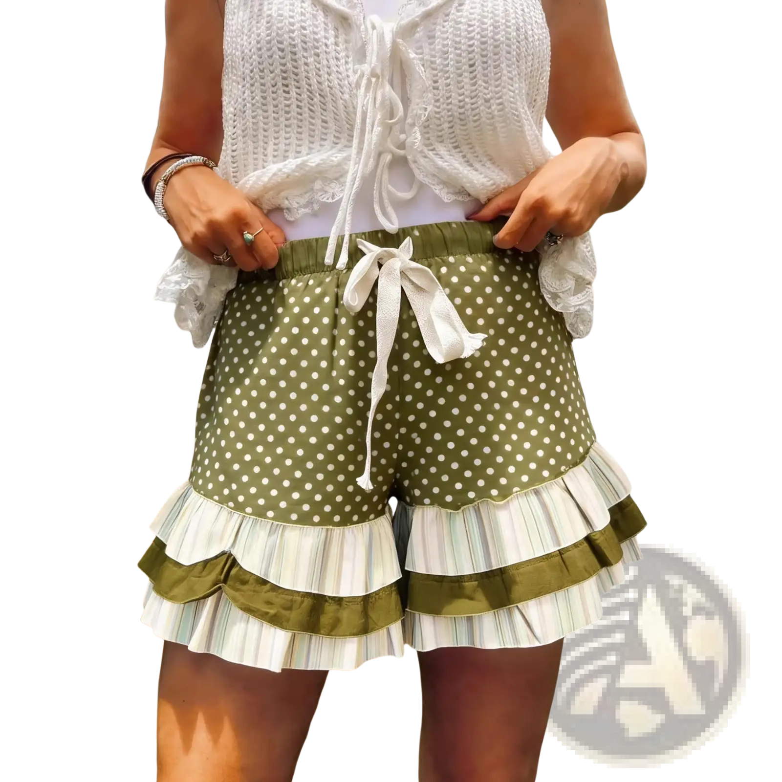 Olive green shorts with white polka dots feature layered striped ruffles and a matching drawstring waist in plaid patchwork style