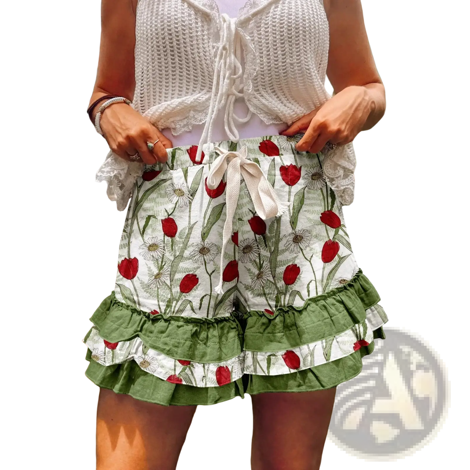 White and green floral print shorts with ruffled hem paired with plaid patchwork a-line skirt design