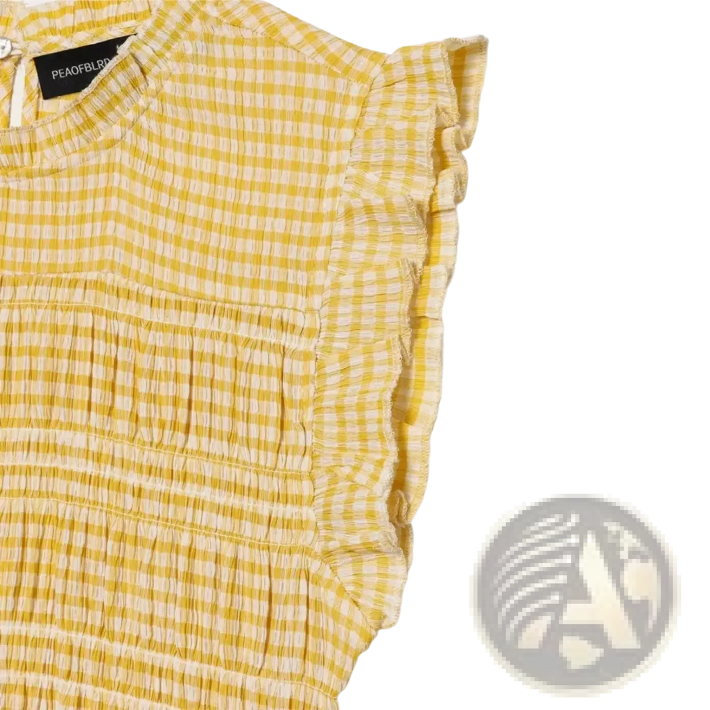 Yellow and white gingham check sleeveless summer tank top with ruffled sleeves for a stylish warm weather look