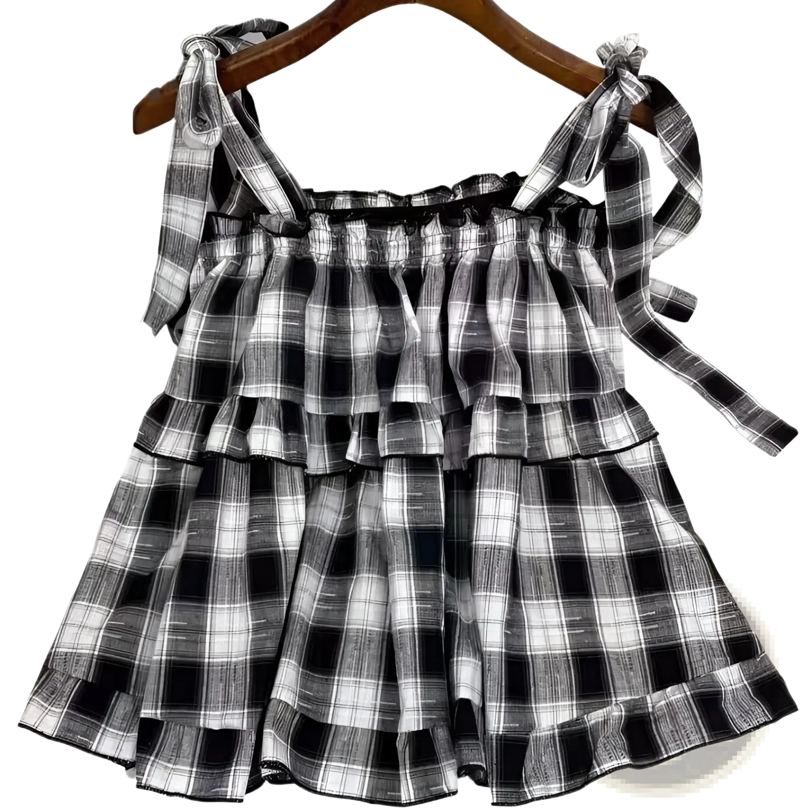 Black and white plaid tiered dress with ruffles and tied shoulder bow straps perfect for casual wear