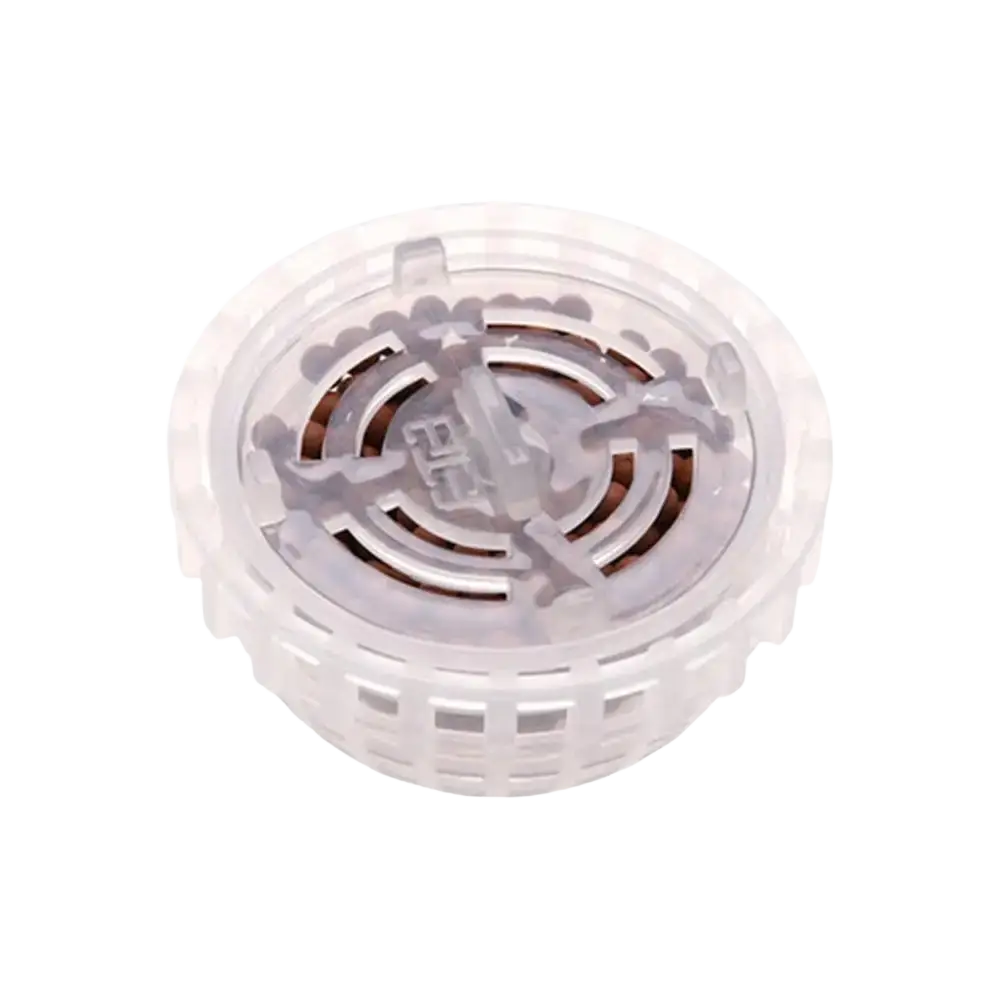 Clear plastic aquarium moss ball holder and filter dome cap with circular gear-like design and textured edge