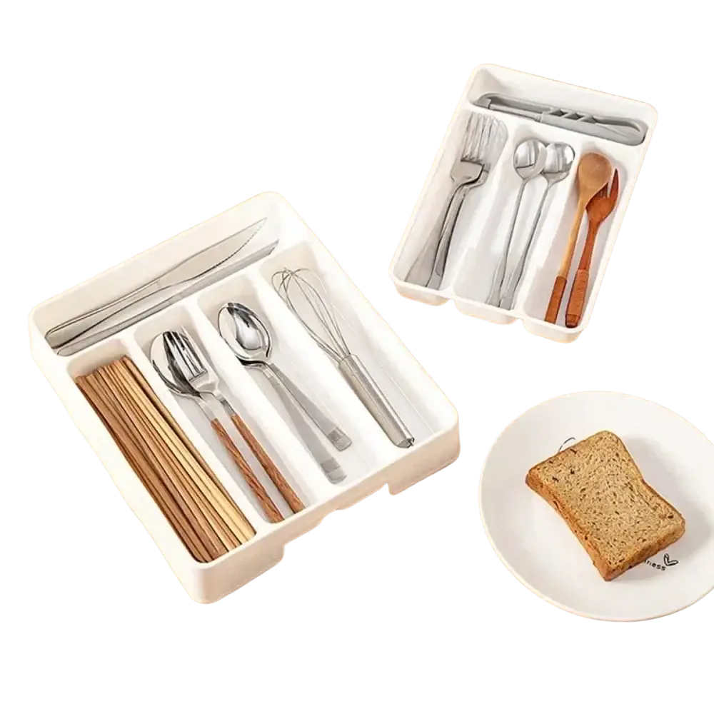 White plastic cutlery drawer organizer with compartments for knives forks spoons chopsticks and a whisk tray