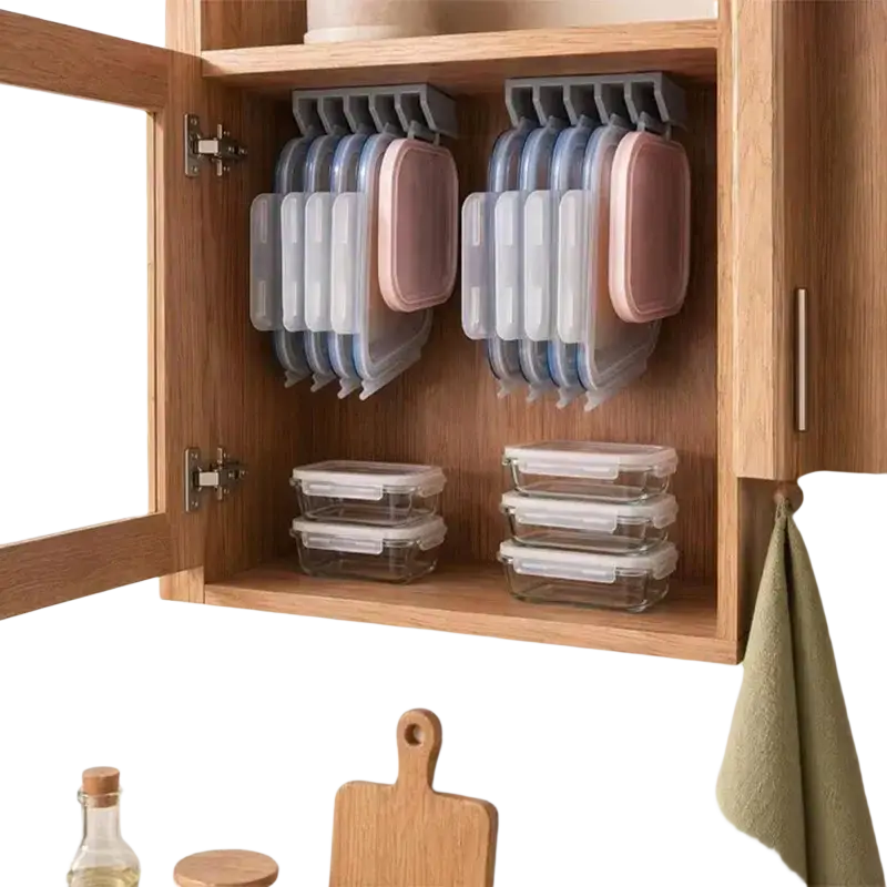 Clear glass food storage containers with white plastic lids neatly stacked in a wooden cabinet using a lid holder rack