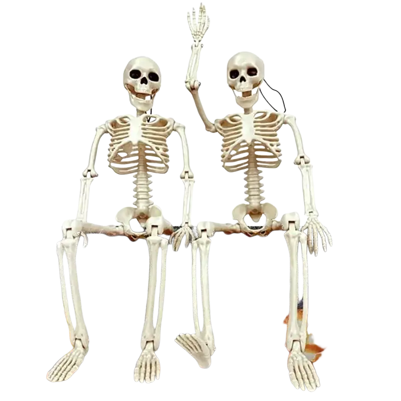 Two beige plastic halloween skeleton decorations with articulated joints one waving and one sitting beside it