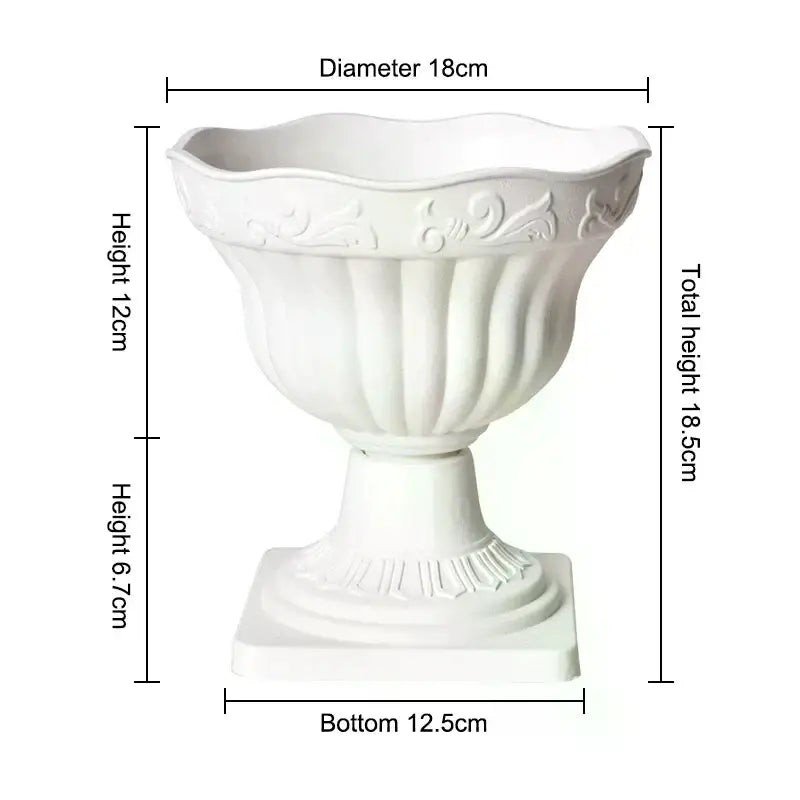 White plastic roman column urn planter with fluted scalloped rim and classical relief detailing flower pot