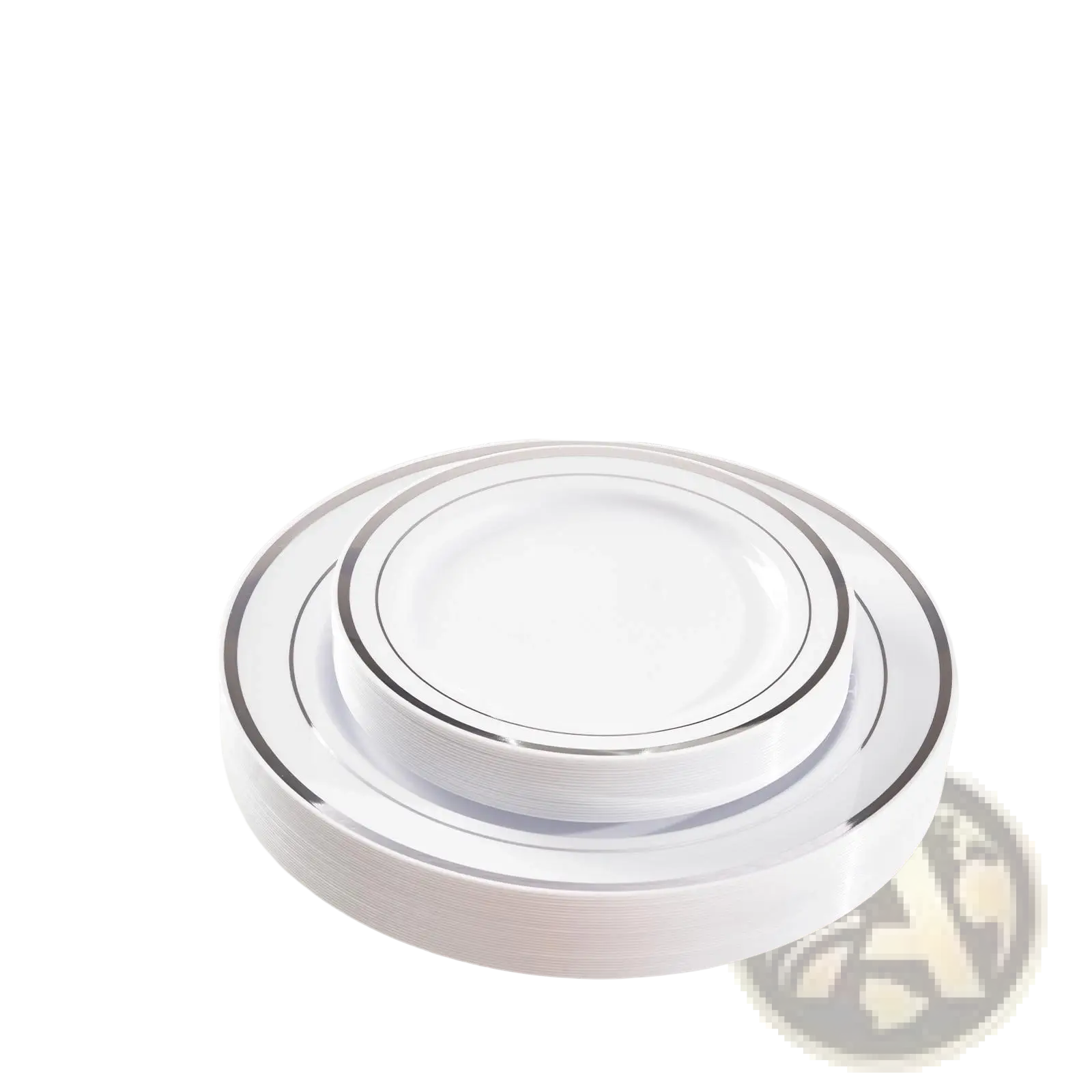 Stack of white plastic plates with silver rim accents in a plastic tableware set for 50 guests