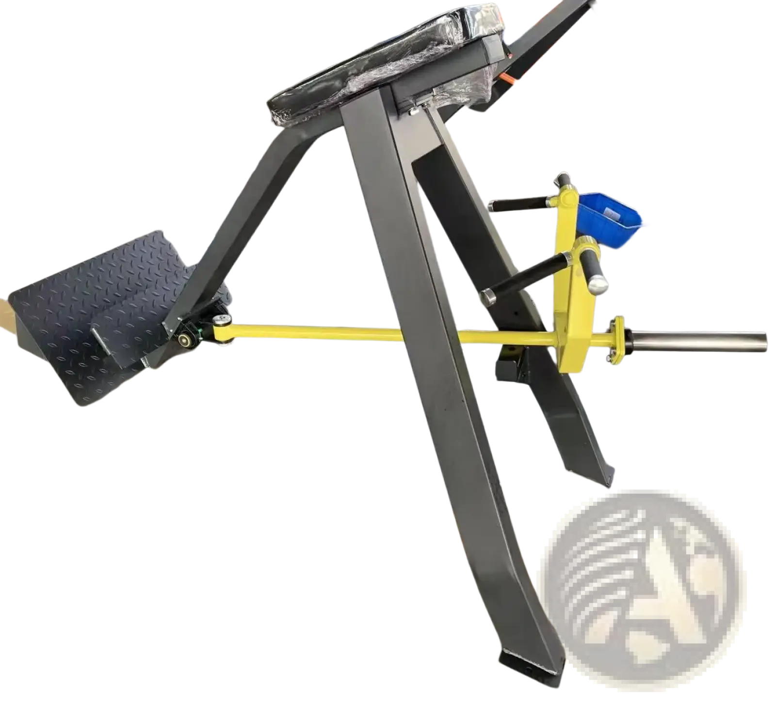 Plate loaded seated row machine with black and yellow metal frame textured footplate and adjustable resistance bar