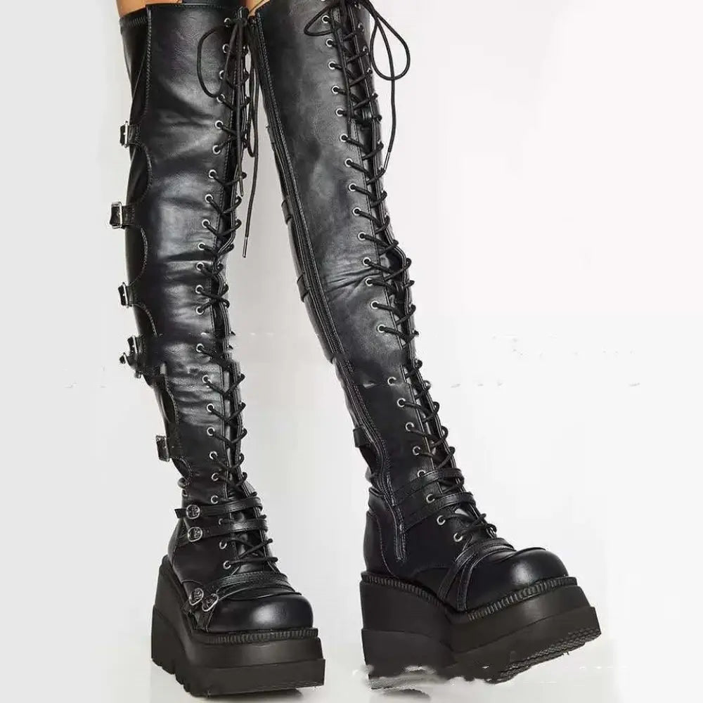 Women’s lace up black leather thigh high platform boots with laces buckles and chunky sole in back view
