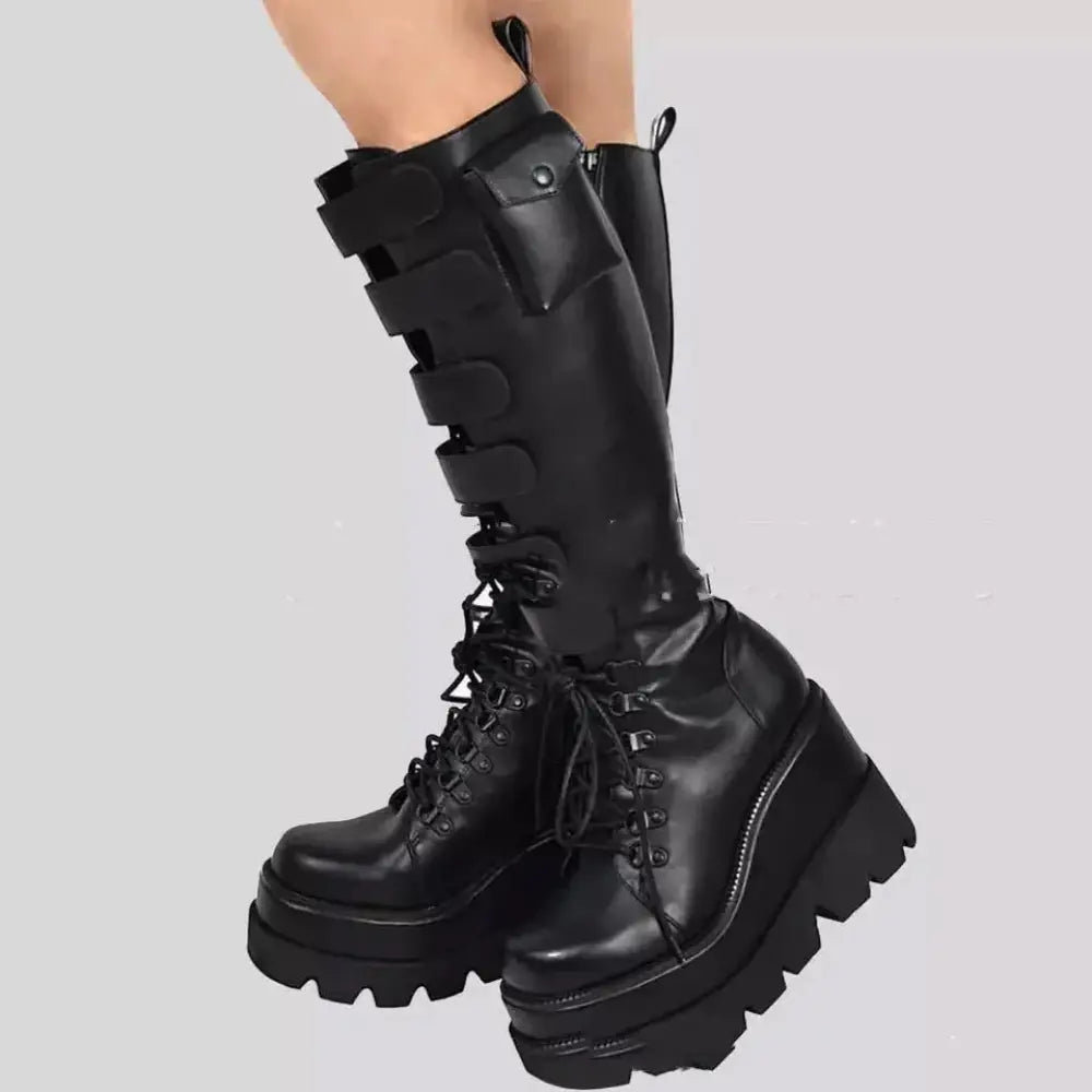 Women’s black leather lace up thigh high boots with chunky platform soles and adjustable straps