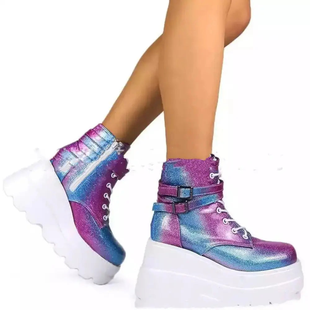 Women’s lace up leather thigh high platform boots with iridescent purple and blue glitter, white laces, and thick white sole