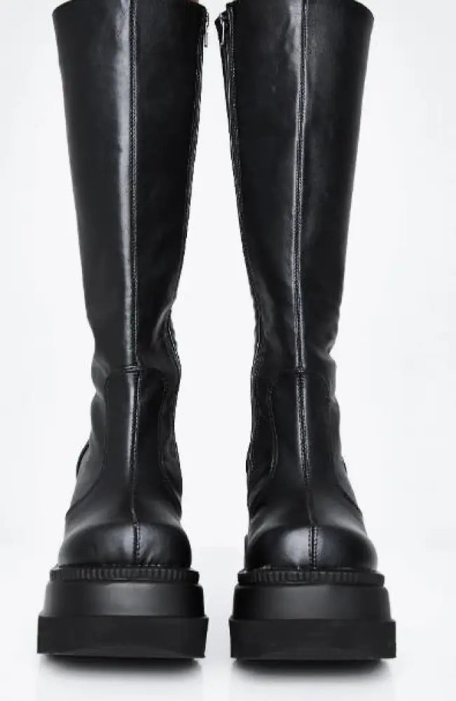Black leather knee-high boots with thick platform soles and side zippers for women lace up thigh high style